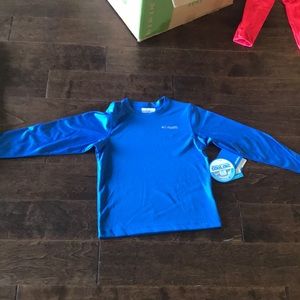 A bundle of to long sleeve shirts